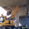 Cool Pictures - Tractor Stuck In A Bridge