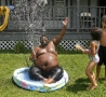 Funny Pictures - Fat Guy in a Kid's Pool