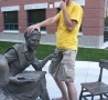 Funny Pictures - Happy With Statue