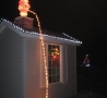 Christmas Pictures - Santa Peeing Off the Roof