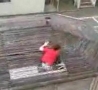 Funny Links - Kid Jumps Off One Roof Through Another
