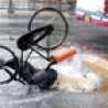 Funny Pictures - Cyclist Hits Puddle