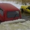 Funny Pictures - Ice Swallows Cars